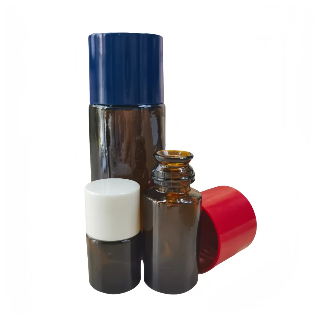 A real-life photo of an pour-out round glass bottle