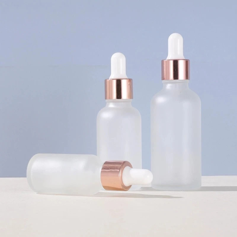 Rose gold-rimmed Frosted Glass Dropper Bottle with Round Shoulder Rose gold-rimmed Frosted Glass Dropper Bottle with Round Shoulder