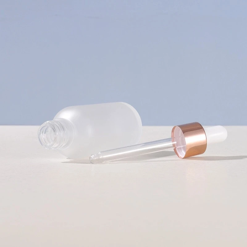 Rose gold-rimmed Frosted Glass Dropper Bottle with Round Shoulder Rose gold-rimmed Frosted Glass Dropper Bottle with Round Shoulder